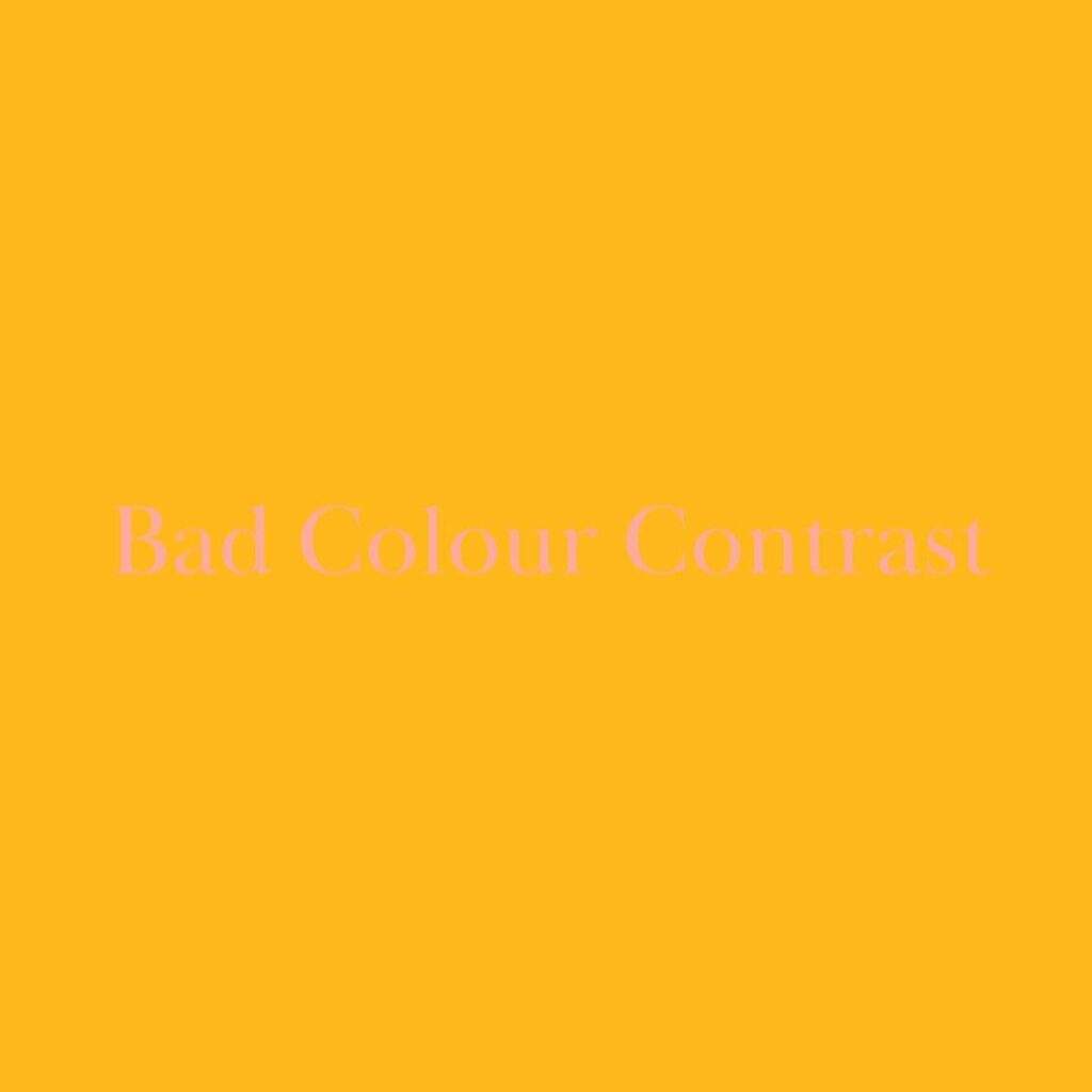 An image with a yellow background and 'Bad colour contrast' written in light pink