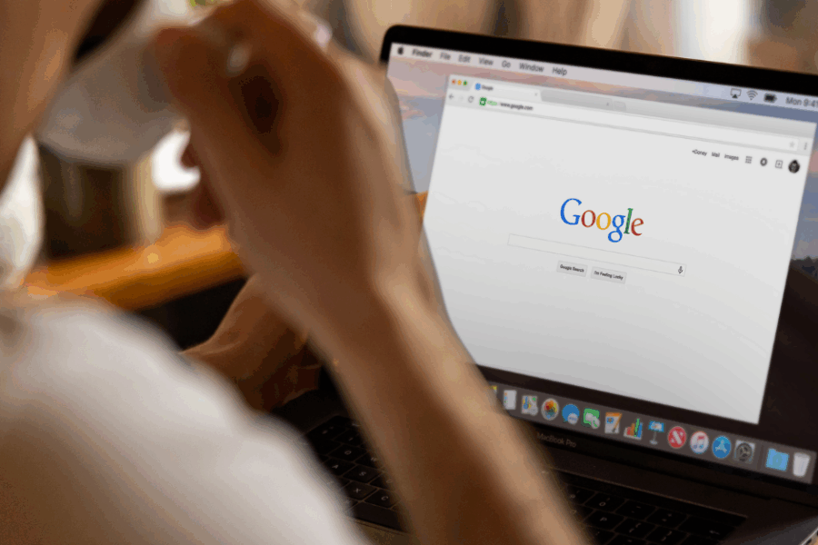 SEO for AI Overviews, someone sipping on a coffee about to search in Google.