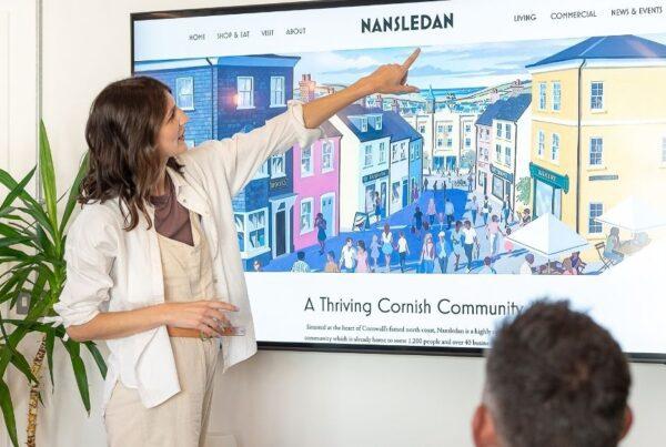 Accessibility in UX - A designer pointing at the font on a website homepage