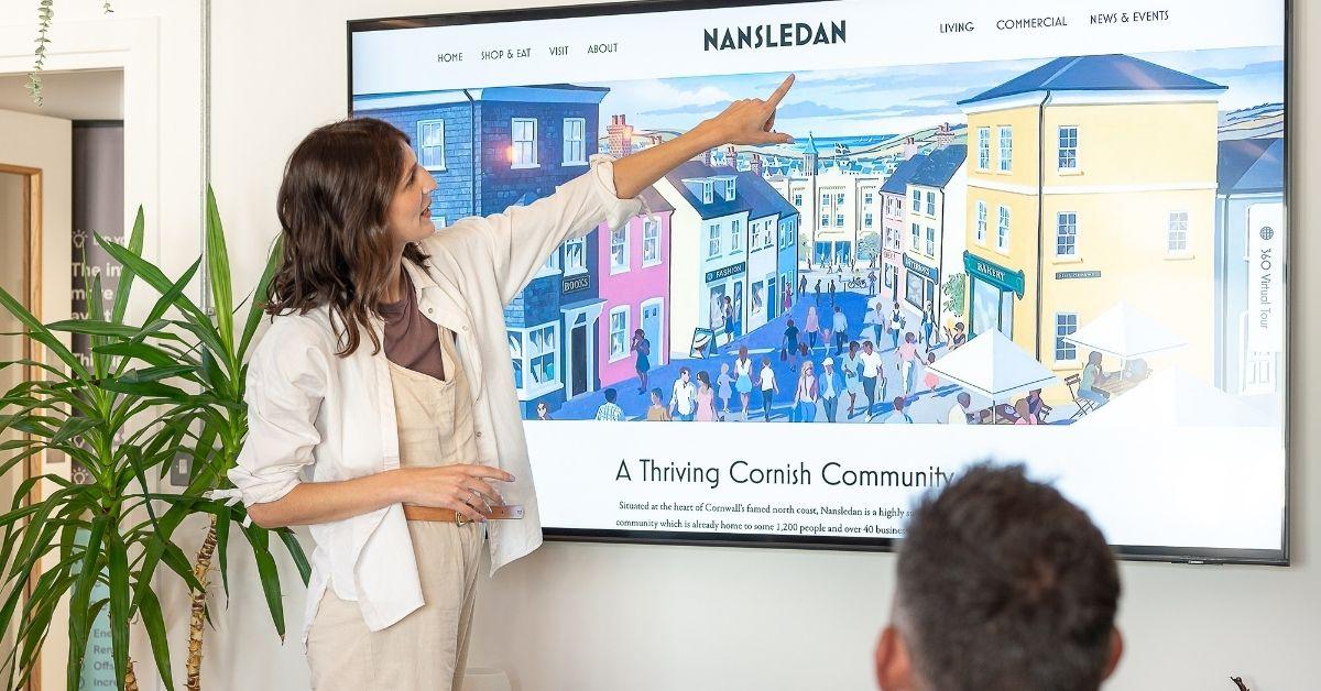 Accessibility in UX - A designer pointing at the font on a website homepage