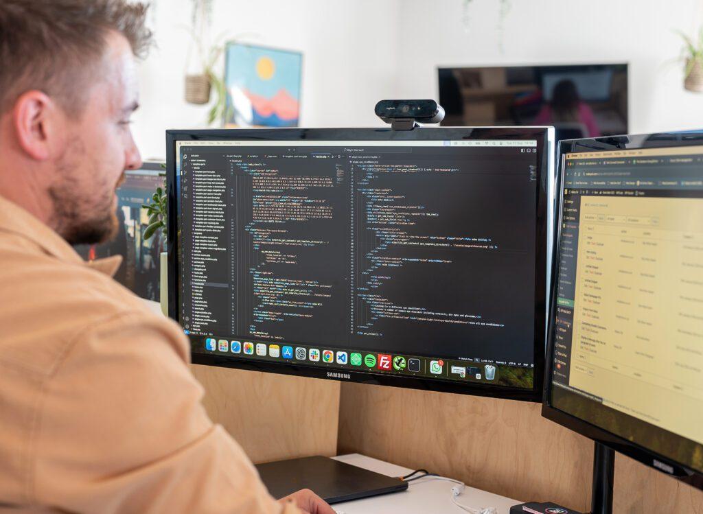Website coding on a computer screen for website maintenance.