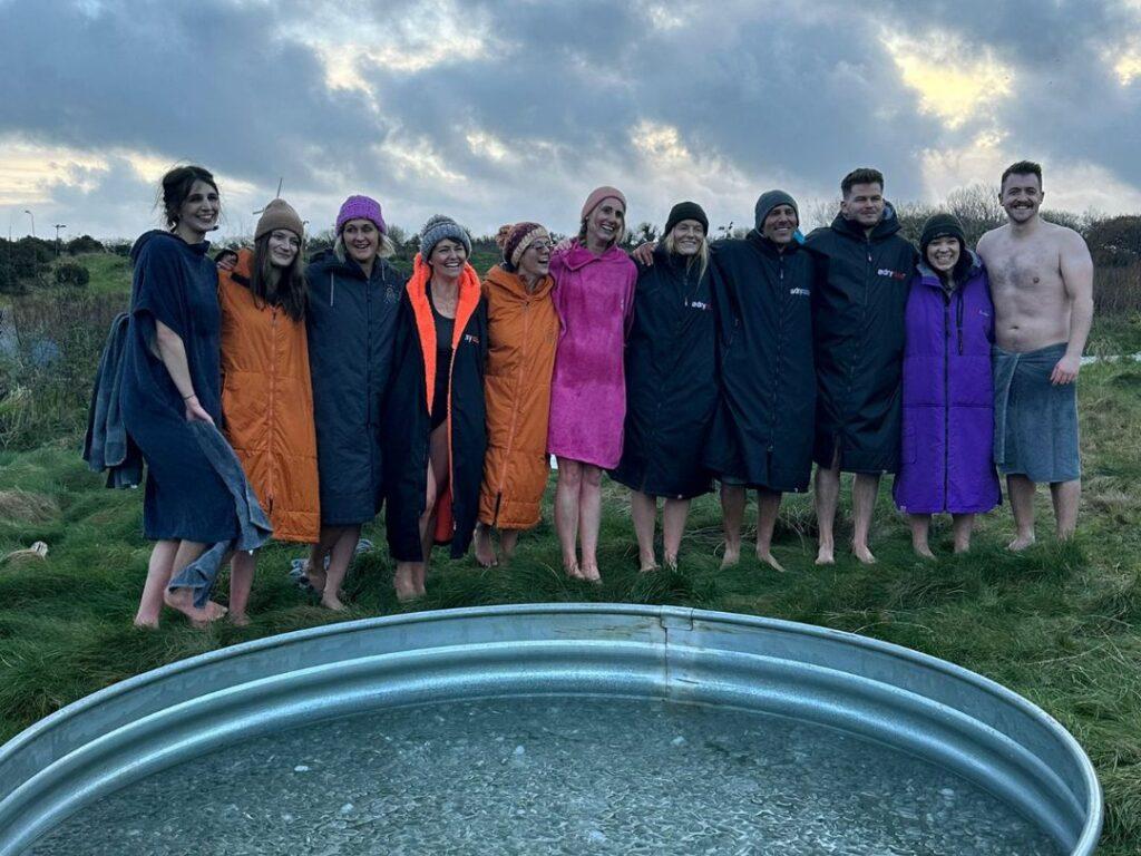 Solve team in dry robes and towls after icebath