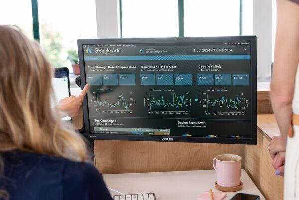 backhead of a woman looking at a screen of SEO results