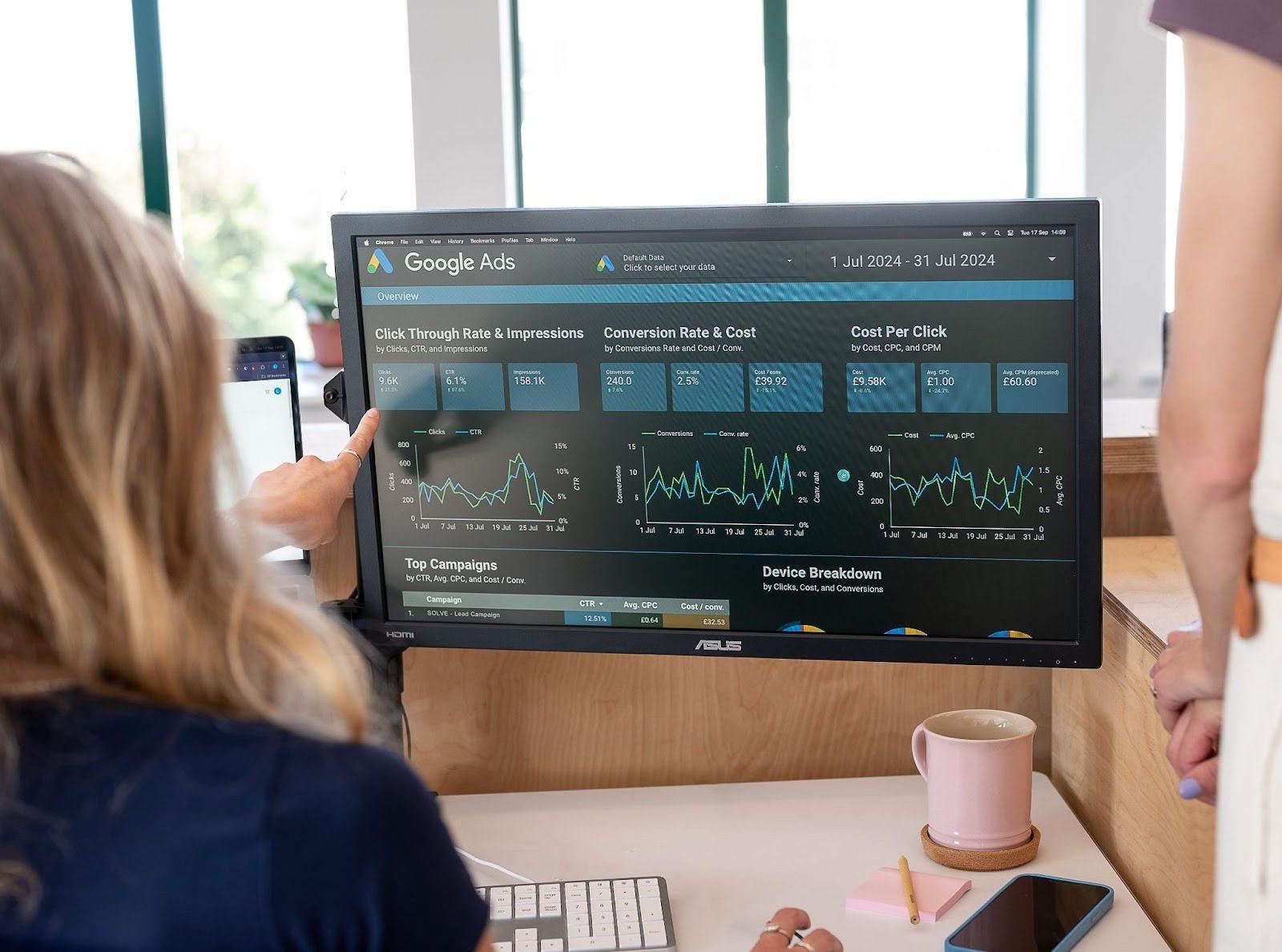 backhead of a woman looking at a screen of SEO results