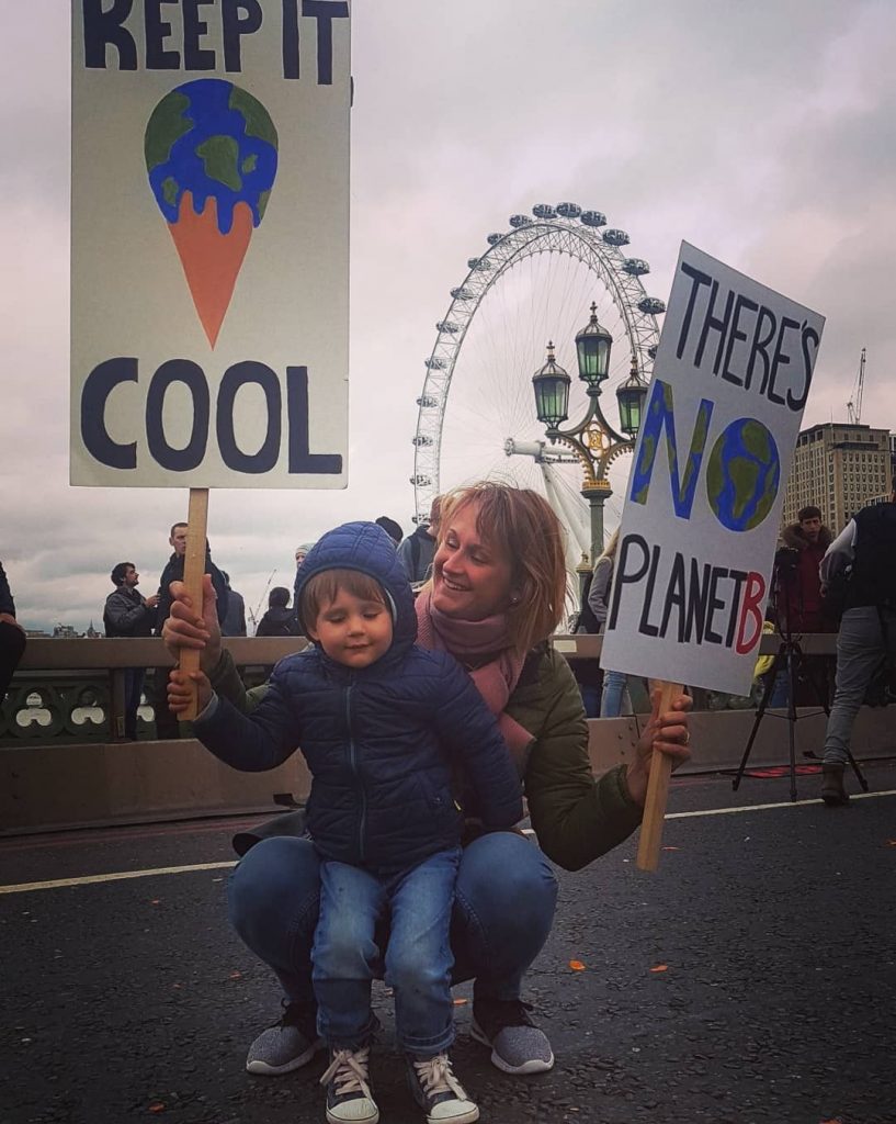 woman and boy at climate change protest